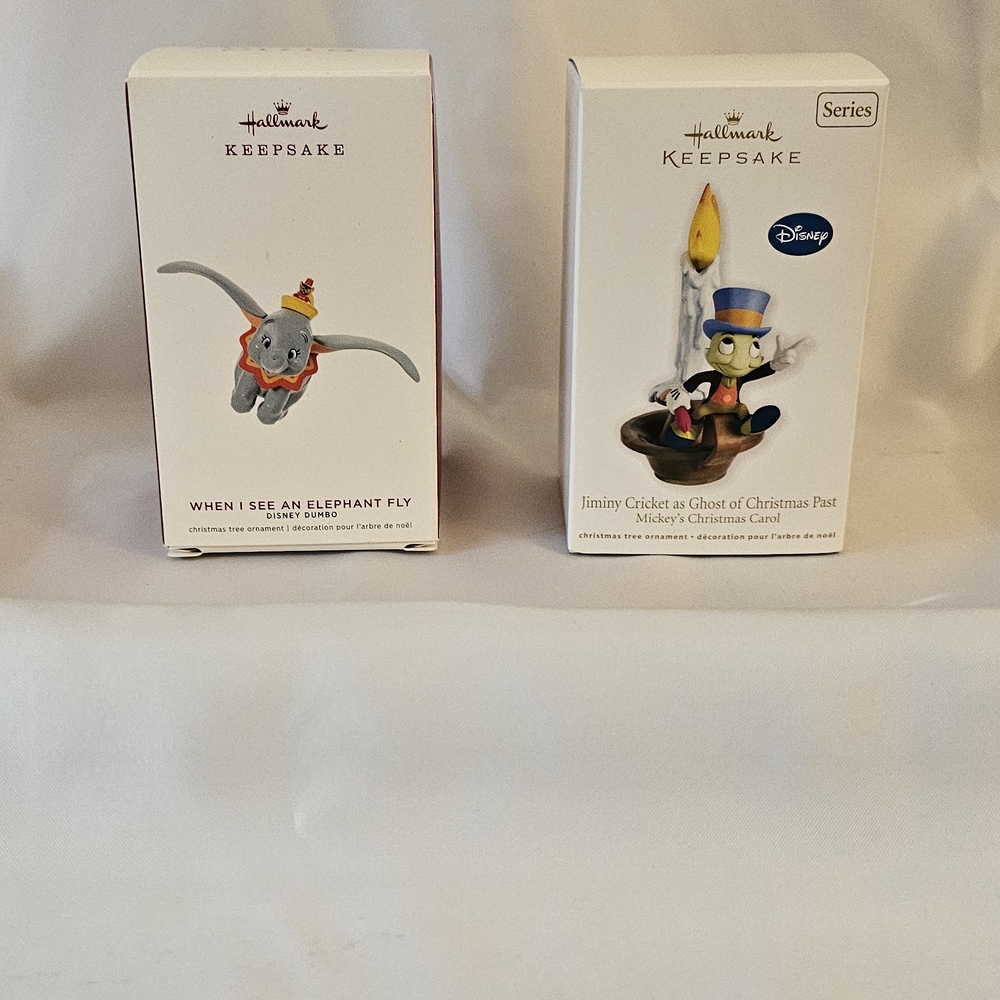 Hallmark keepsake ornaments, jiminy cricket and when I see an elephant fly